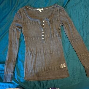 Aeropostale button up long sleeve tee in see through lace pattern.  Size M.